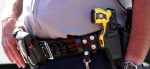close up of an officer's belt, complete with a taser